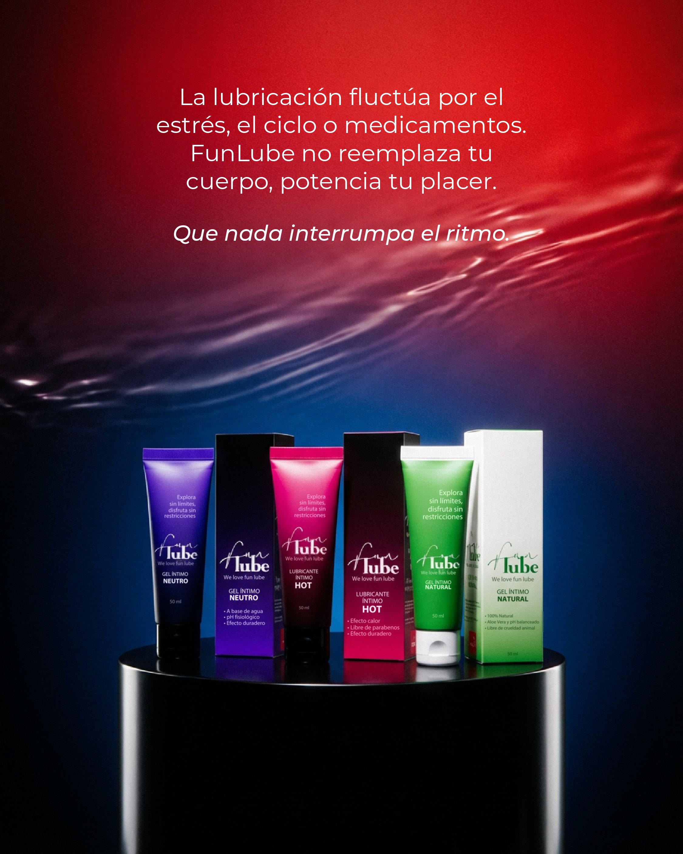 Post de la línea completa: tubos y cajas de FunLube Neutro, Hot y Natural sobre un pedestal negro, con luz roja y azul.